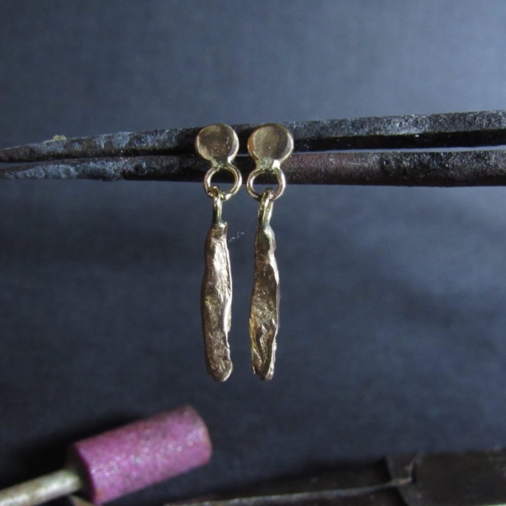 Gold earrings. 14 karat yellow gold earrings.